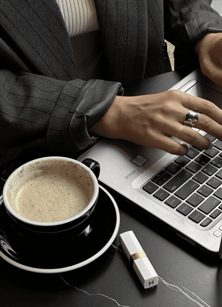 Our Blog Logo design process on laptop showing a refreshed and simplified brand logo update (logos).